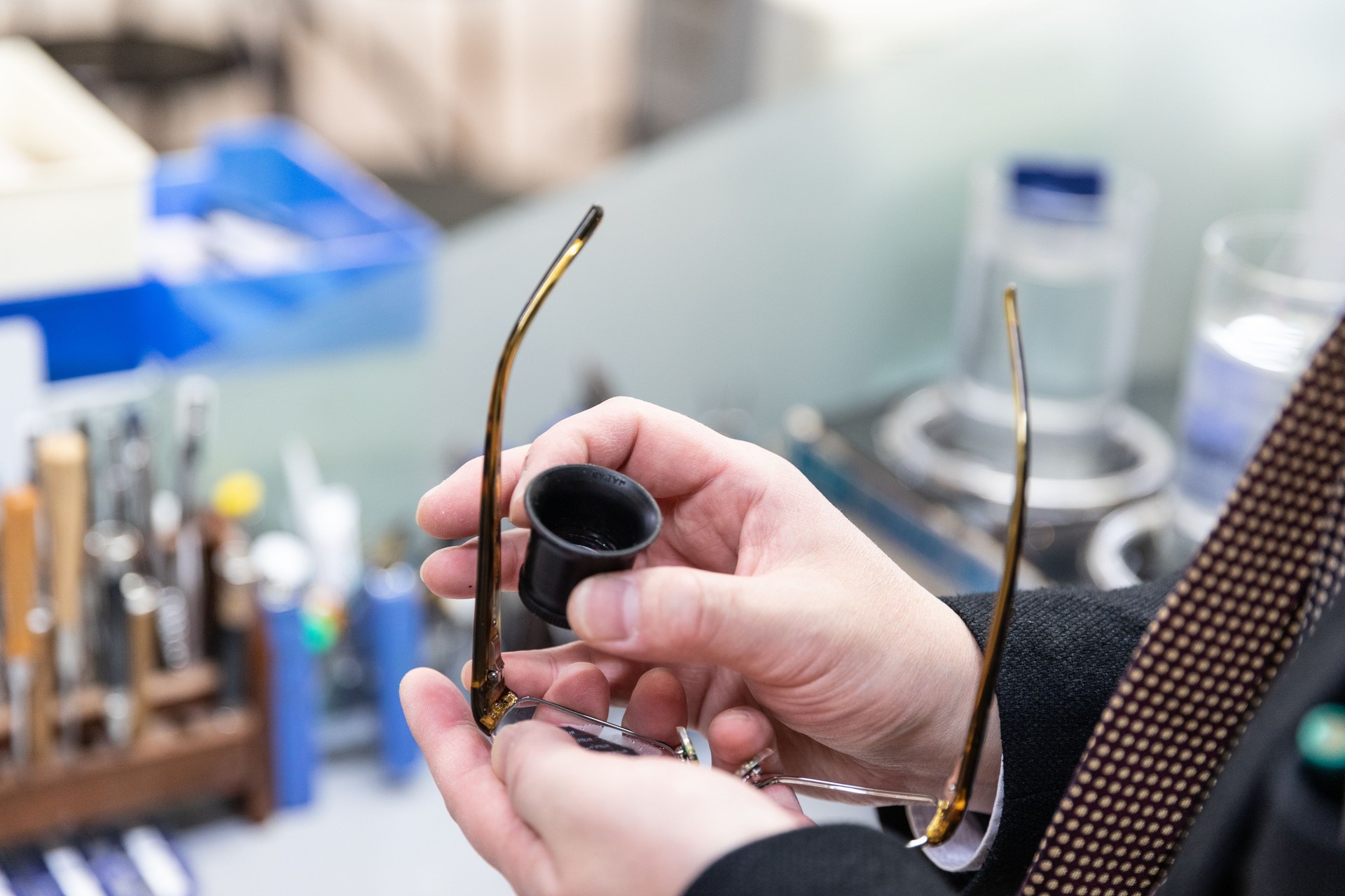 Optician making eyeglasses