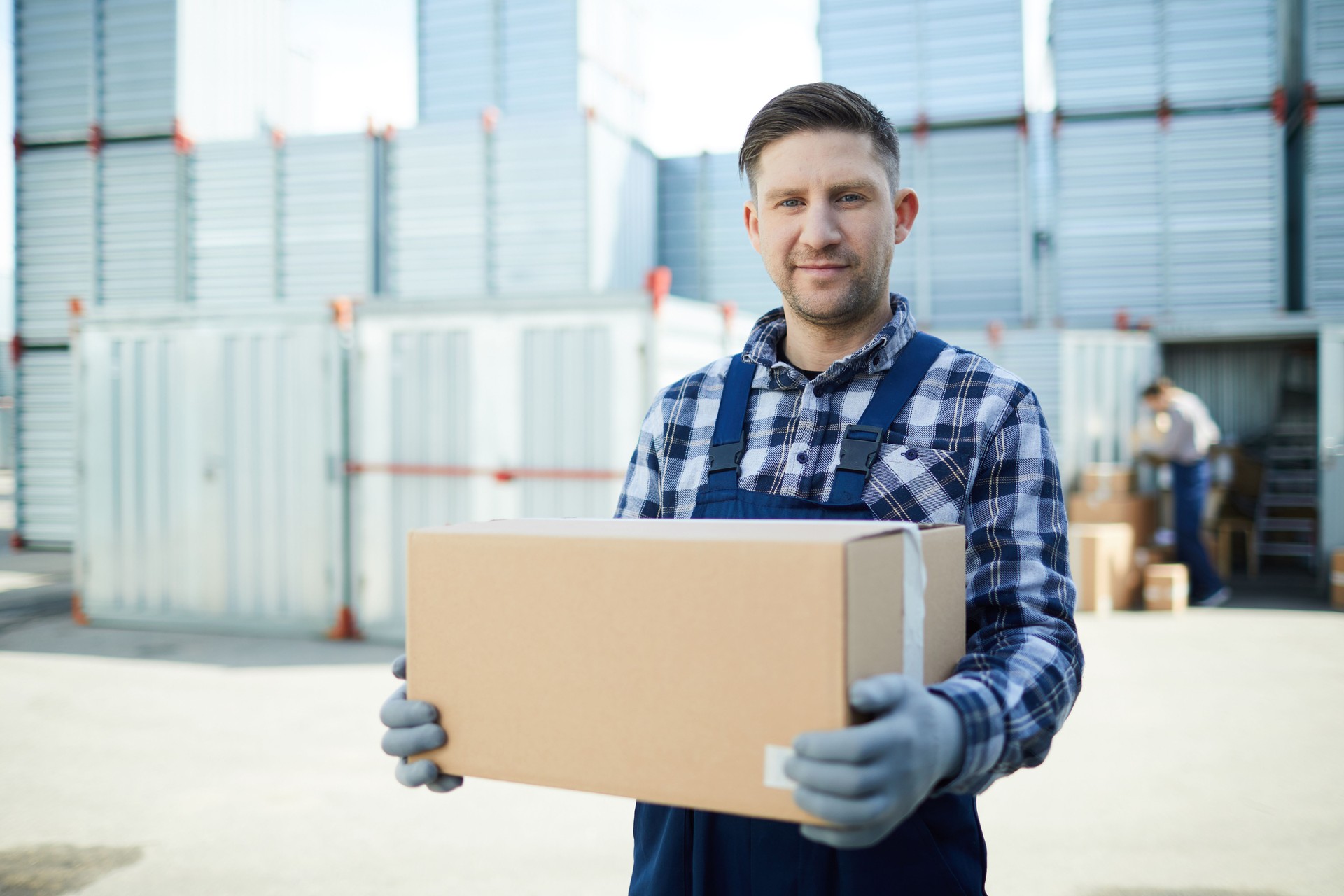 Worker at container storage area